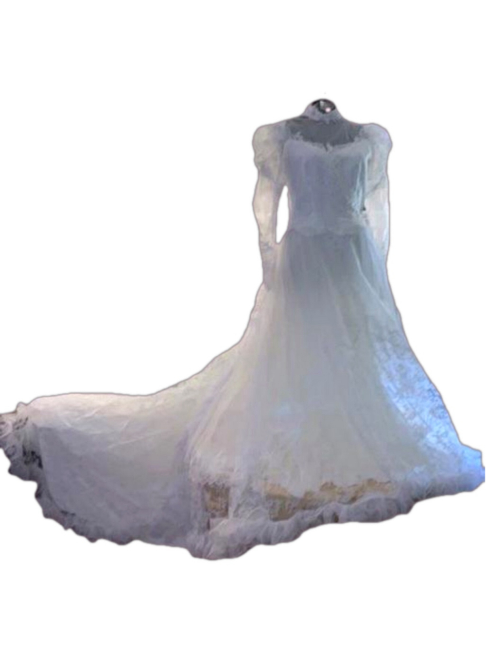 Traditional white wedding dress with lace and beadwork and a long train